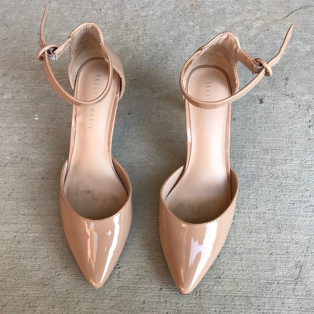 Patent leather nude pumps.